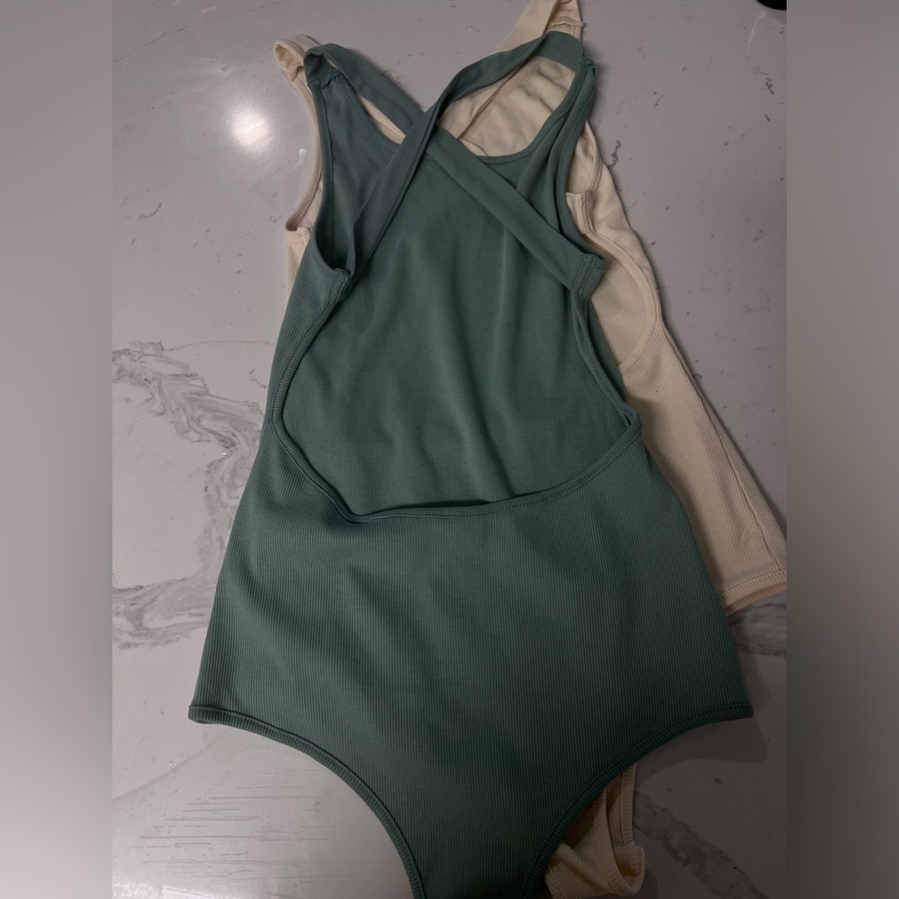 Bundle three backless bodysuits